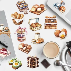 Detailed view of 50pcs clear PET baking stickers on a laptop for journal decoration