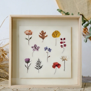 Close-up of vintage waterproof PET stickers featuring botanical flowers and fern leaves