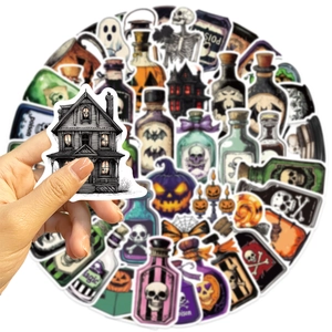 Close-up of Halloween magic potion stickers featuring haunted house and pumpkin designs