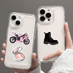 Detailed view of clear iPhone cases with cute cartoon girl stickers and glossy TPU texture