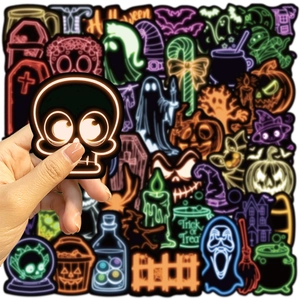 Close-up of neon Halloween stickers featuring skull and ghost designs on waterproof PVC
