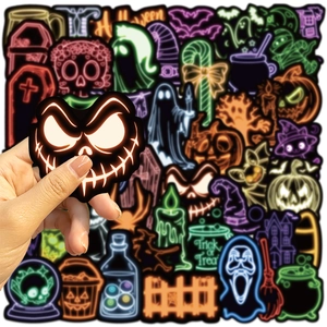 Detail showing waterproof neon Halloween stickers with pumpkin face and ghost designs