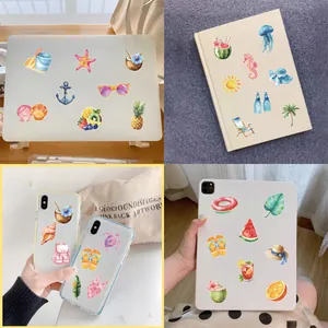 Detail shots of watercolor summer beach PET stickers on laptops and phone cases