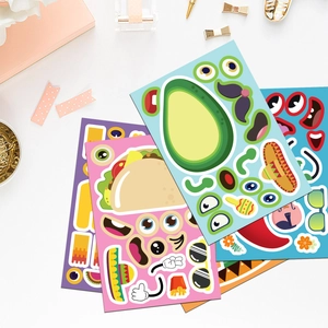 Close-up of DIY Mexican fiesta stickers featuring taco and avocado cartoon faces for kids