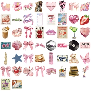 Flat lay detail of 50 pink coquette aesthetic stickers featuring bows and floral motifs