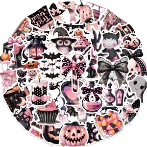 Détail d'autocollants Halloween rose et noir avec hiboux et citrouilles sur fond blanc