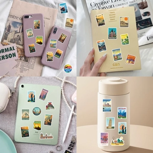 Application of vintage travel stickers on a phone case, notebook, and water bottle