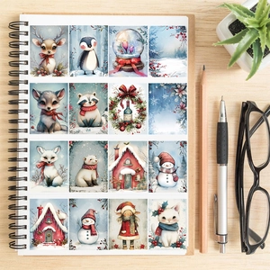 Close-up of winter wonderland stickers on a spiral notebook with a wooden background