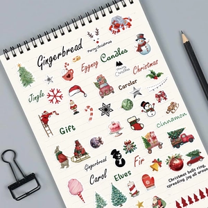 Detailed view of Christmas DIY stickers with festive elements on a white notepad page