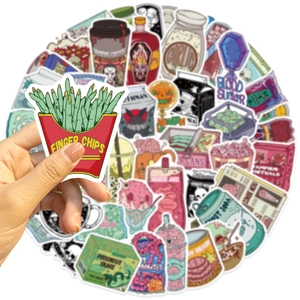 Detail of horror food stickers showing finger chips and snake designs for DIY decor