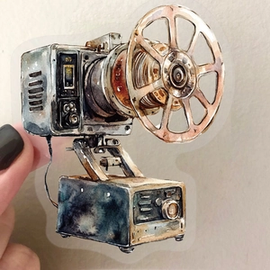 Detail of vintage watercolor film projector sticker showing PET transparency and size