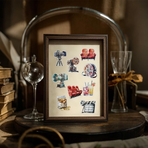 Detail view of retro watercolor cinema stickers with vintage projector and film camera