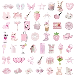 Close-up of pink Korean style aesthetic stickers for journal decoration and laptops