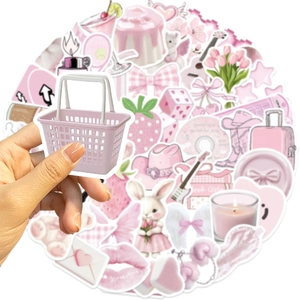Detailed view of pink Korean style aesthetic stickers with mini shopping basket accessory