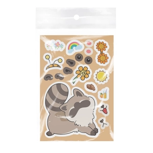 Detail of DIY raccoon stickers kit with various facial expressions and accessory elements