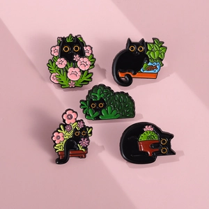 Set of five cute black cat enamel pins featuring floral designs and garden themes