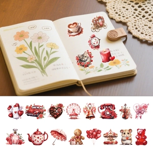Macro detail of various vintage heart stickers and romantic illustrations for journaling