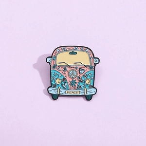 Retro cartoon bus enamel pin with floral patterns and Peace lettering on light purple background