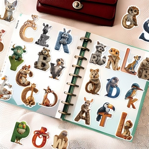 Close-up of 3D realistic animal alphabet stickers for children's educational notebooks