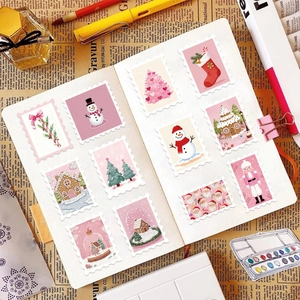 Christmas pink cartoon stamp stickers collection on notebook with vintage decorative props