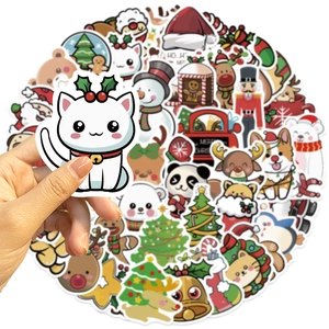 Close-up of waterproof Christmas cartoon stickers showing detail of cat and festive designs