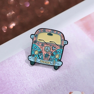 Pink and teal vintage hippie bus enamel brooch with peace sign and floral patterns