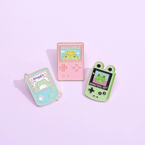 Three-piece set of cartoon frog game console enamel pins in pastel macaron colors
