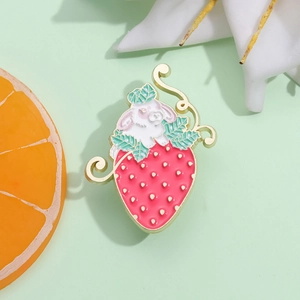 Cute strawberry bunny enamel pin made of gold-plated metal with white rabbit and red fruit