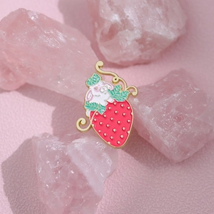 Cute strawberry rabbit enamel pin badge with gold plating on pink crystal stones