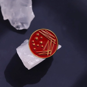 Creative red enamel petri dish brooch with gold bacteria pattern for science lovers