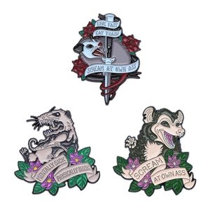 Three creative Opossum hard enamel pins with American tattoo style floral designs