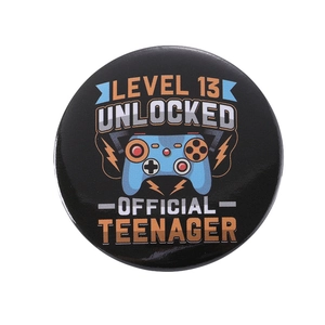Level 13 Unlocked tinplate badge with game controller design for 13th birthday