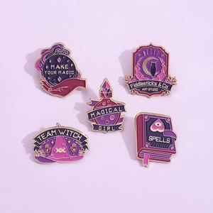 5-piece set of purple magic enamel pins featuring crystal ball, spell book, and witch hat