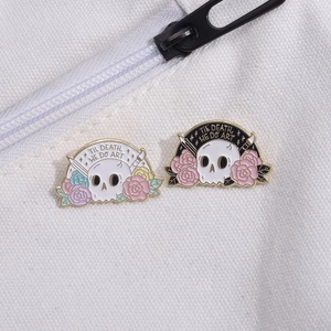 Skull and colorful roses enamel pins with Til Death We Do Art text on canvas bag