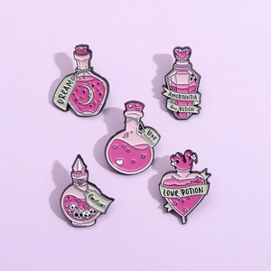 Five-piece set of purple and pink magic potion enamel pins with Dream and Love text