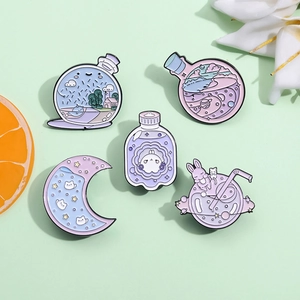 Set of 5 cute Japanese enamel pins with rabbit, moon and galaxy designs in pastel colors
