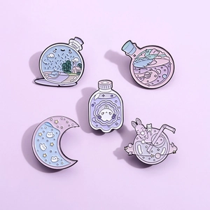 5-piece set of cute enamel pins featuring cartoon bunnies, magic bottles and crescent moon