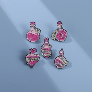 Detailed view of five purple and pink fantasy magic potion bottle enamel pins on a blue background
