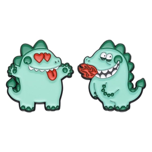 Lot de deux broches dinosaures de dessin animé vert menthe avec yeux en cœur et feu