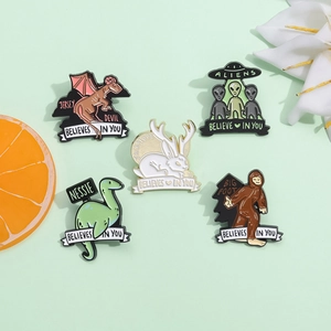5-piece mystical creature enamel pin set featuring UFO, aliens and legendary monsters