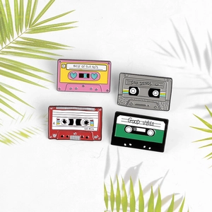Retro cassette tape enamel pins set featuring vintage 90s designs for jackets and bags
