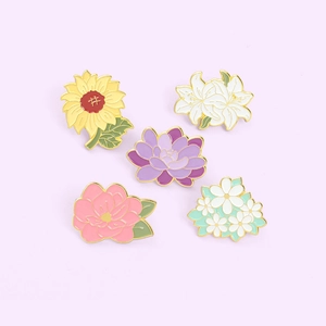 5-piece set of enamel flower pins featuring sunflower and lily motifs for clothing decor