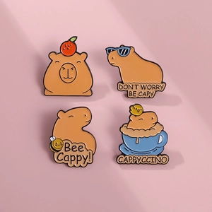 Detail view of 4-piece cute capybara enamel pin set with creative puns on pink background