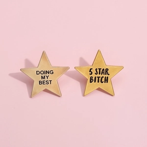 Set of two gold star enamel pins with black engraved text Doing My Best and 5 Star Bitch