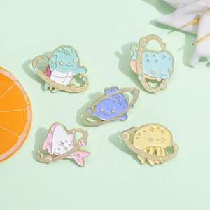 Set of five colorful animal planet enamel pins featuring cute rabbit and shark designs
