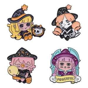 Set of four cartoon witch enamel pins featuring magical girls and powerful scroll motifs