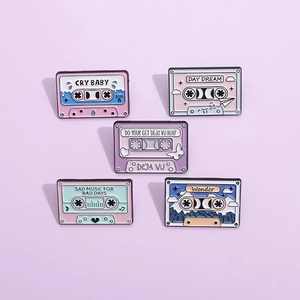 Retro cassette enamel pin set in pastel colors featuring creative illustration designs