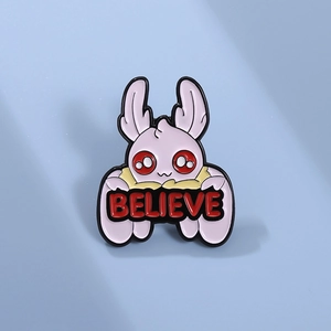 Cartoon mothman enamel pin badge with red believe sign and large eyes for clothing decor