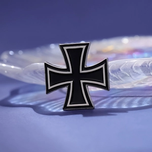 Classic black and white metal cross brooch badge with polished silver edges