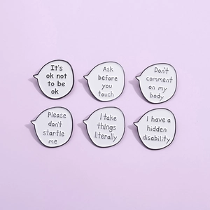 Set of 6 motivational enamel pins with inspirational quotes on soft purple background